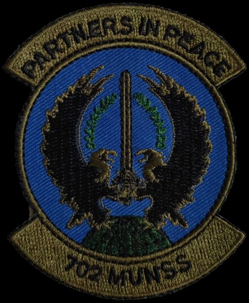 702nd Munitions Support Squadron (702 MUNSS) (full-color (blue disc, OD scrolls/border)) patch